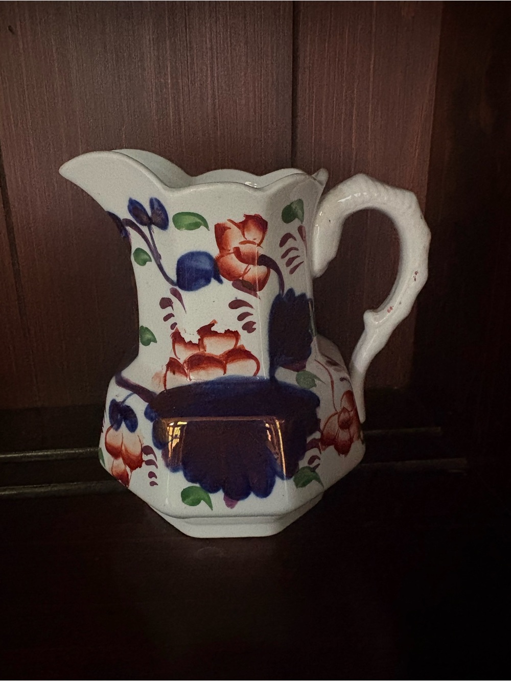 Antique Ceramic Floral Pitcher with Blue and Red Hand-Painted Accents